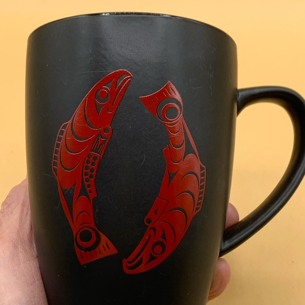 Black Ceramic Cup, Mugwith Red Salmon indigenous art Logo